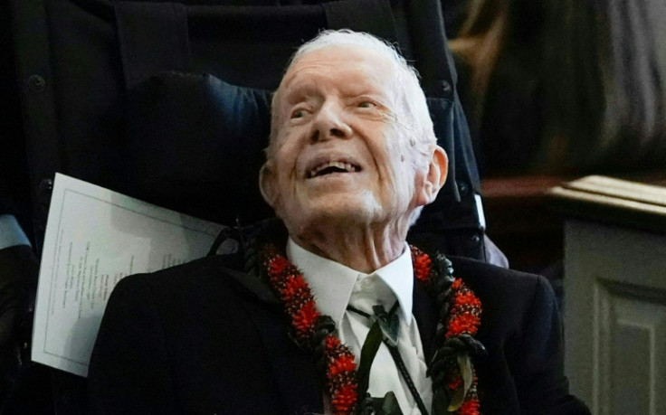 Former president Jimmy Carter departs the funeral service for his wife, former first lady Rosalynn Carter, at Maranatha Baptist Church, in Plains, Georgia, in November 2023