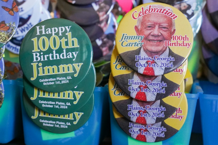 Buttons celebrating former US president Jimmy Carter's birthday are seen at the Plains Peanut Festival on September 28, 2024, in Plains, Georgia