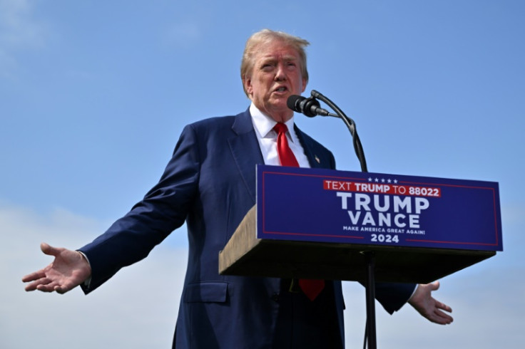 Donald Trump is campaigning in the swing state of Michigan