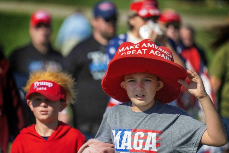 Young supporters arrive for the rally, where security is expected to be tight