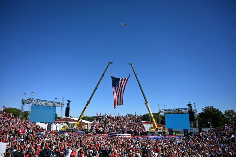 Defiant Trump Jets In To Site Of Rally Shooting