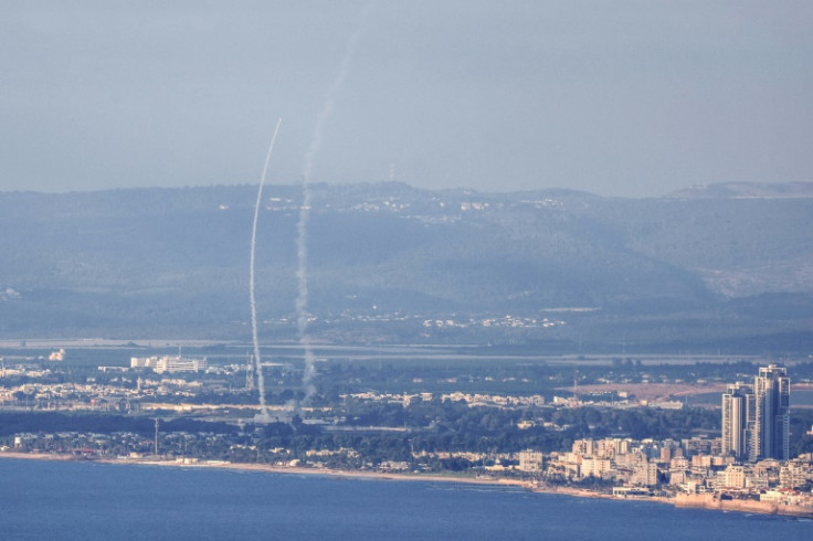 Israeli air defences intercept rockets fired from Lebanon, near Acre in northern Israel