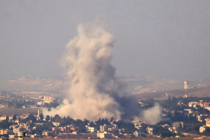 Smoke is seen rising from the site of an Israeli air strike targeting the southern Lebanese village of Kfar Tibnit