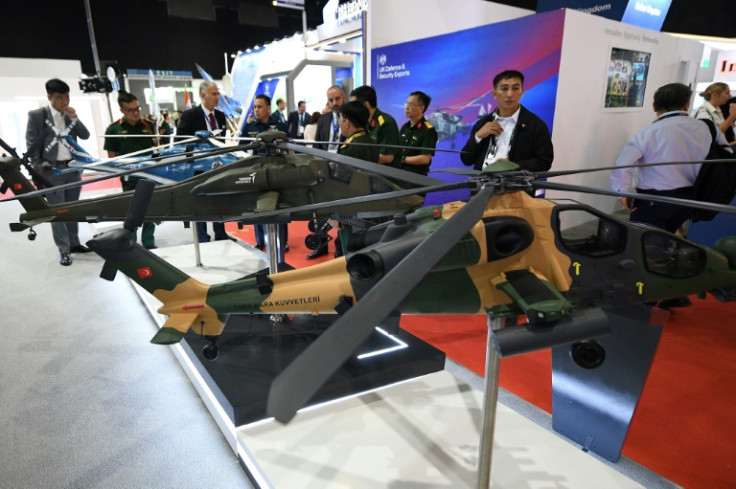 Models of attack helicopters made by Turkish Aerospace Industries (TAI) on display at a defence exhibition in Manila last month