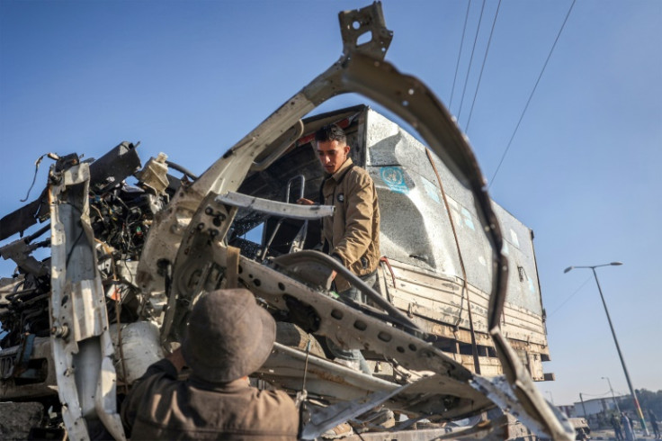 The mangled truck being used by UNRWA workers after it was hit by a strike