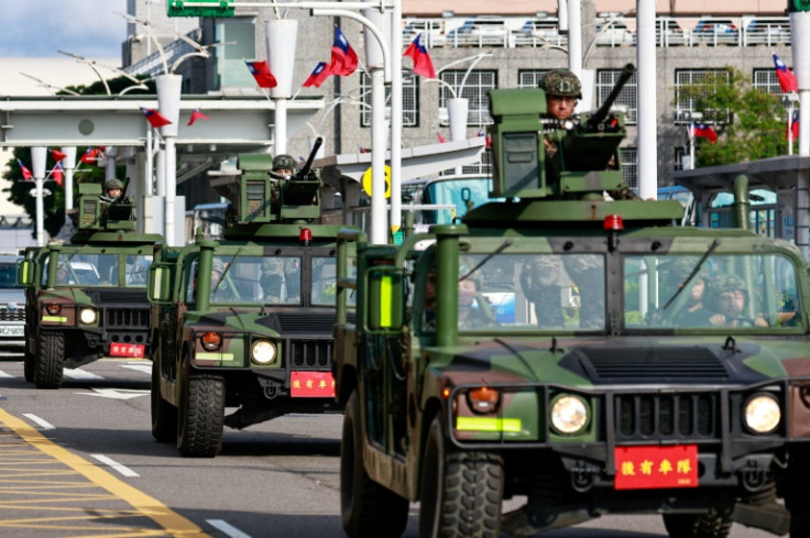 A Taiwan military patrol outside Songshan Airport in Taipei on October 14, when China deployed fighter jets and warships to encircle the self-ruled island during war drills
