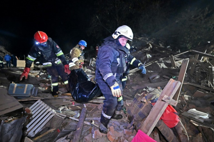 Ukrainian rescuers recovered bodies following an attack on Kharkiv