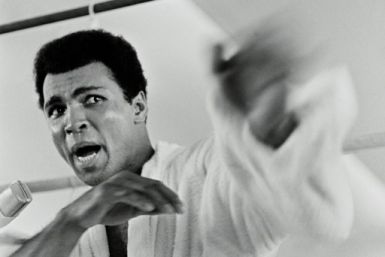 Muhammad Ali playing to the cameras at a press conference three days before The Rumble in the Jungle