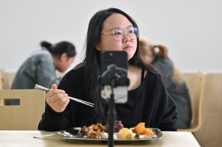 Yang Chi'ao quit her teaching job earlier this year and signed up for a weight-loss camp on the outskirts of southwestern megacity Chengdu