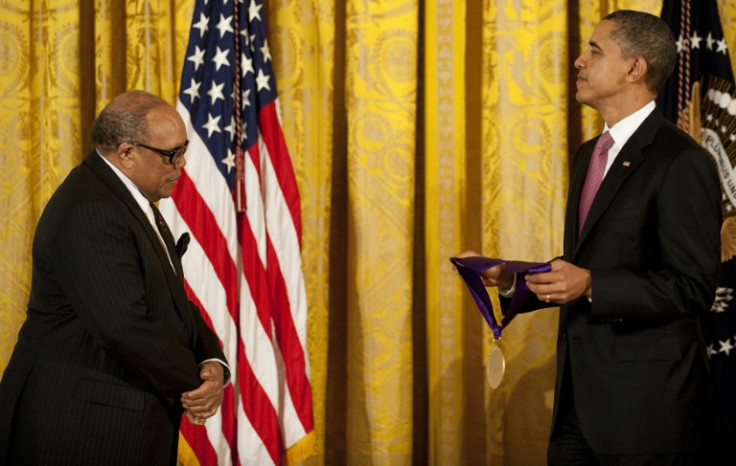 US President Barack Obama (R) awards the 2010 National Medal of Arts to American musician Quincy Jones at the White House