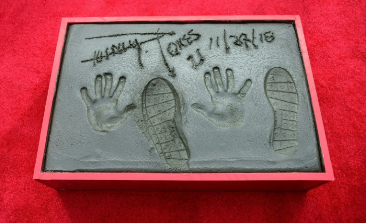 Composer and producer Quincy Jones saw his hand and footprints immortalized outside the TCL Chinese Theater in Hollywood, California