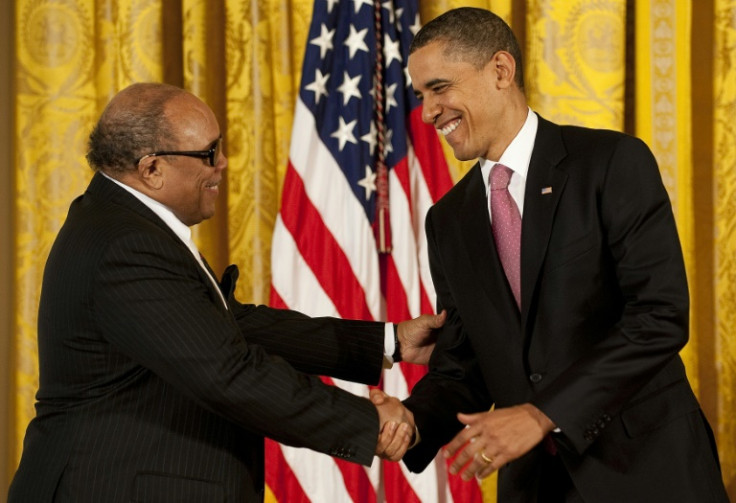 Then-US President Barack Obama awards the National Medal of Arts to Jones at the White House in 2011