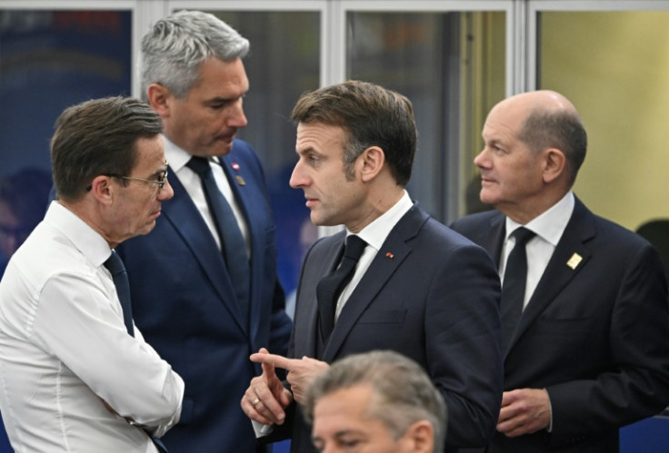 German Chancellor Olaf Scholz at an EU summit in Budapest, seen with leaders from France, Sweden and Austria