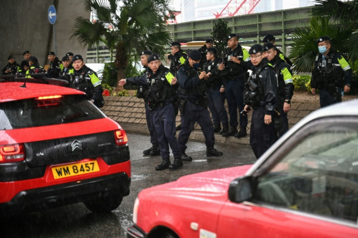 Police man a roadblock outside the Hong Kong courthouse hosting the trial of Jimmy Lai on Wednesday