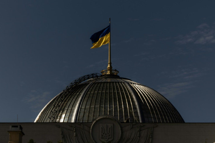 A Ukrainian flag fluttering over the Verkhovna Rada