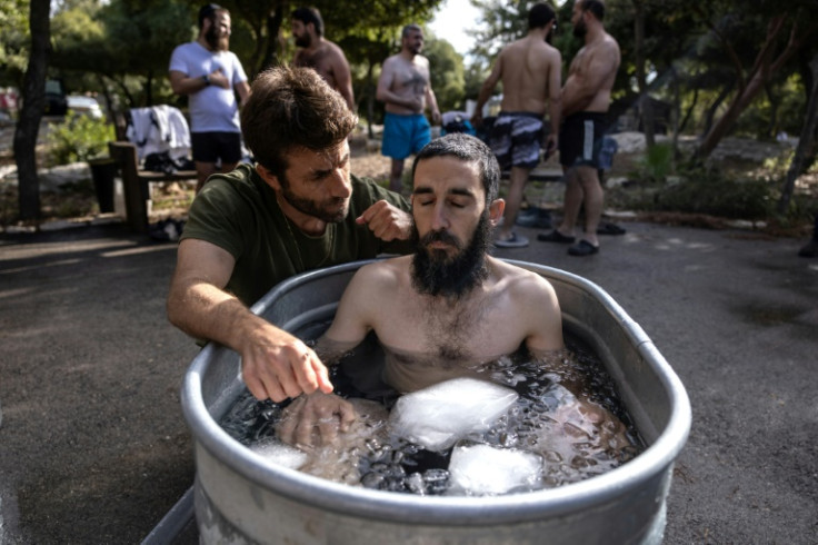 The volunteer Israeli rescue workers, whose role is to collect the remains of the dead, have begun attending group healing sessions