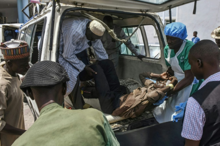 A victim of a recent wave of suicide attacks arrives for treatment at a hospital in Maiduguri, Nigeria, on June 29, 2024