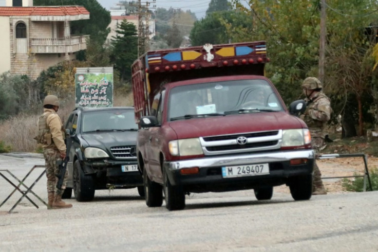 Lebanese army soldiers man a checkpoint in southern Lebanon's Marjayoun area after a ceasefire between Israel and Hezbollah took effect