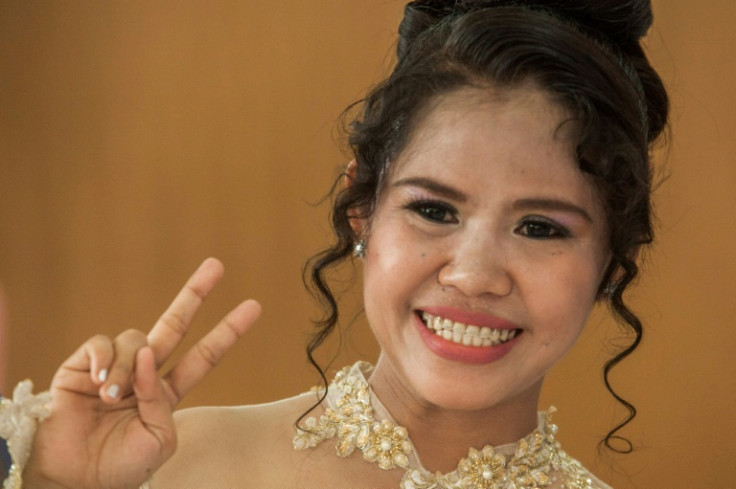 Filipina Mary Jane Veloso, a death row prisoner in Indonesia, smiles at a 2016 event during her incarceration