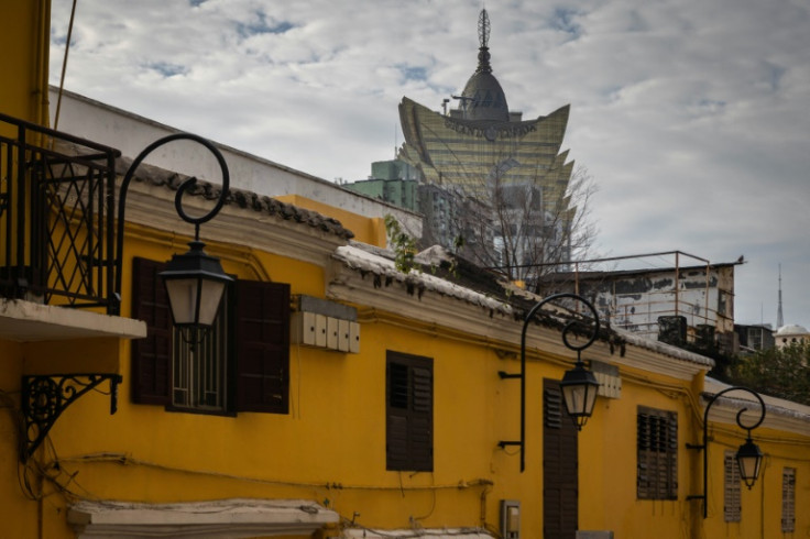 The Grand Lisboa Casino looms over a colonial neighbourhood in Macau, which has long surpassed Las Vegas as the world's top casino hub