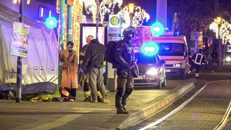 Police and emergency services at the site of the deadly attack on Friday night