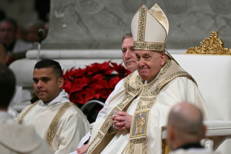 Pope Francis presided over a sombre Christmas Eve mass in the Vatican