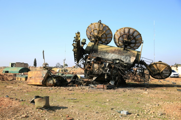 A damaged mobile military radar at a position of Syria's former army south of Aleppo, after a war monitor reported Israeli strikes