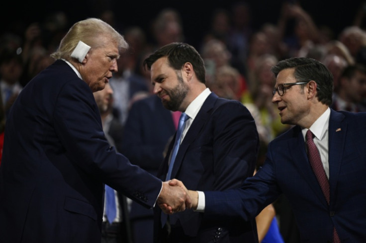 Mike Johnson, pictured (right) shaking Donald Trump's hand at the 2024 Republican National Convention, has the support of the president-elect