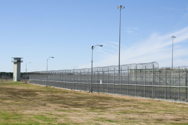 A guard tower is seen by the fenced perimeter of the Allan B. Polunsky Unit, the prison that houses the 169 men on Death Row in Livingston, Texas