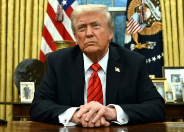 US President Donald Trump speaks to the press after signing an executive order in the Oval Office of the White House in Washington, DC, on February 10, 2025.