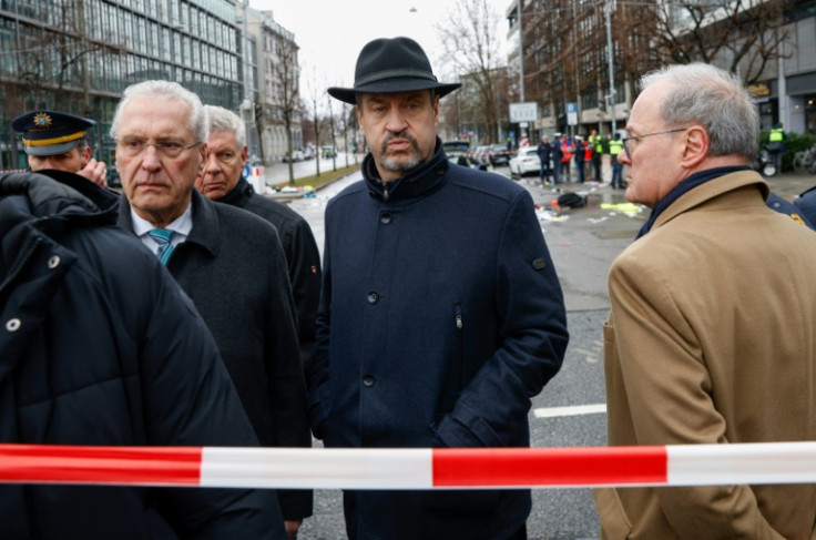 'We must show determination that something will change in Germany,' said Soeder (centre), who visited the scene