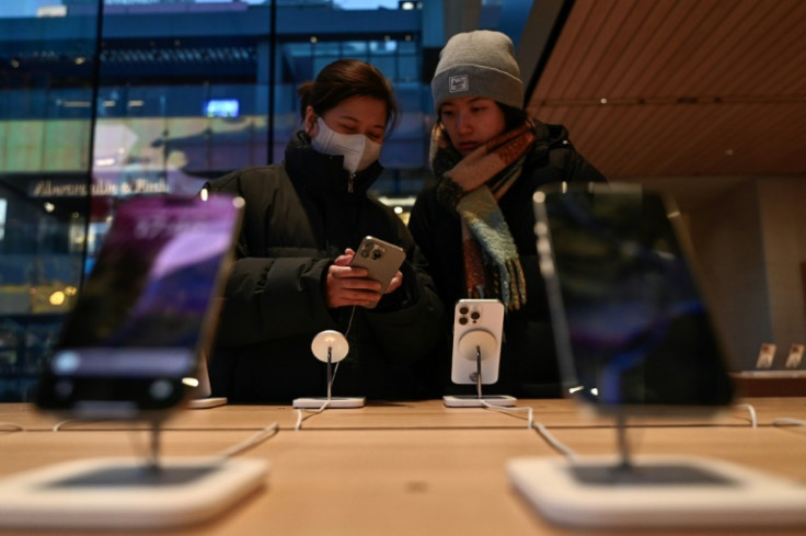 Apple's iPhone is facing intense competition in China, where Alibaba Group has confirmed an artificial intelligence partnership with the Silicon Valley tech titan