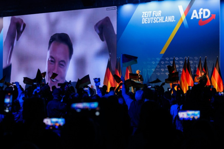 US tech billionaire Elon Musk is seen on a large screen at a campaign event of the far-right Alternative for Germany in Halle, eastern Germany on January 25, 2025