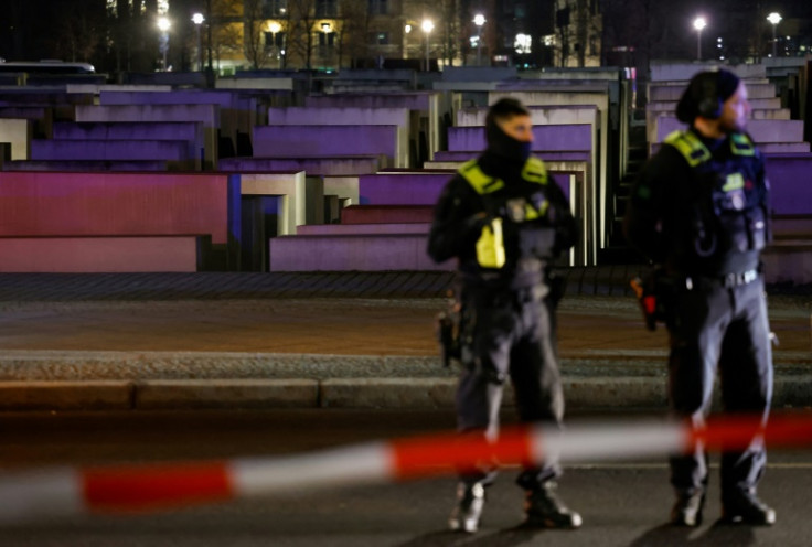Police officers arrested a suspected Friday after a stabbing at the Holocaust memorial in Berlin
