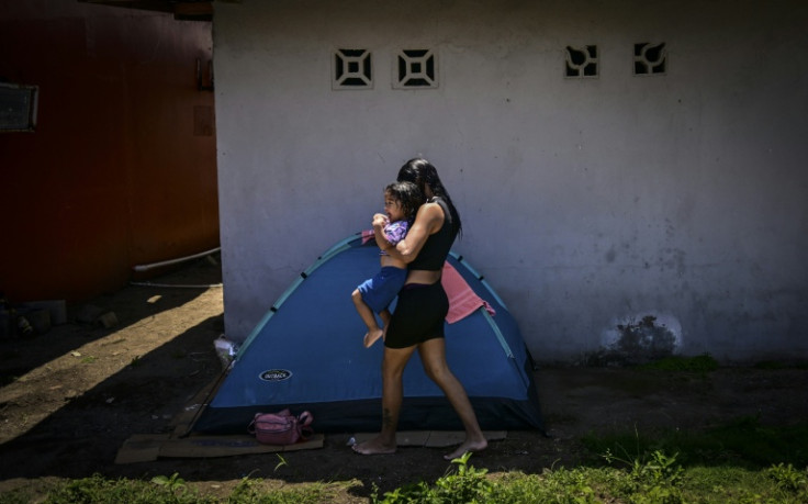 The homebound migrants have already made the arduous journey back from Mexico on foot and by bus