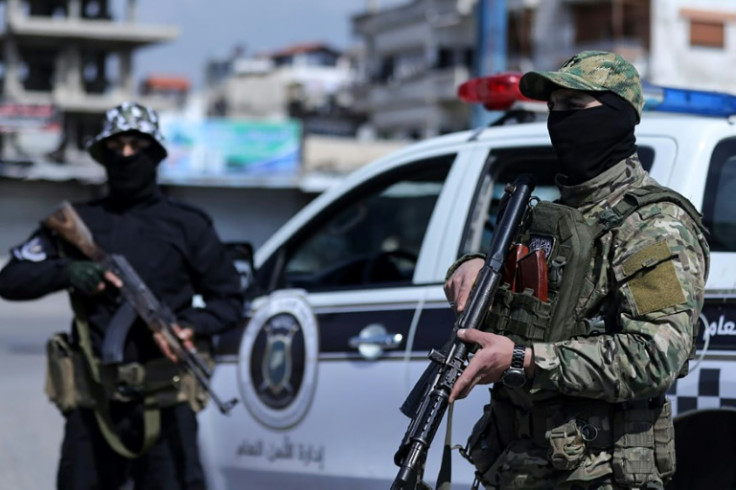 A picture released by the official Syrian Arab News Agency (SANA) shows Syrian forces in the coastal city of Tartus