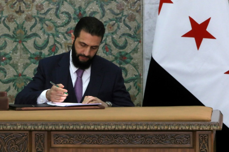Syrian leader Ahmed al-Sharaa signs a new constitutional declaration, which will regulate the country's transitional period