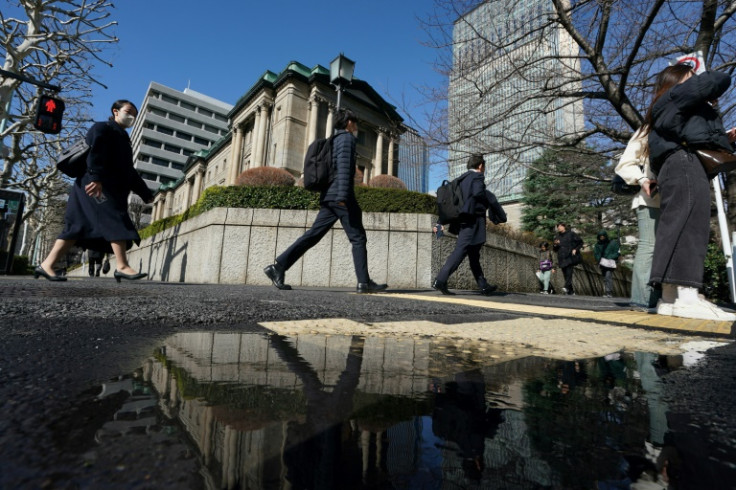 Japanese stocks rose Thursday as traders weigh a central bank policy announcement and markets digested data showing the US economy shrinking in the first quarter