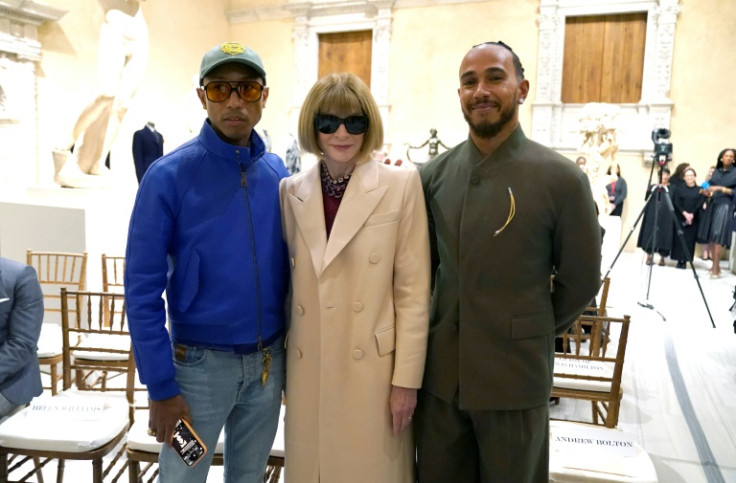 Pharrell Williams (L) and Lewis Hamilton (R), posing with Vogue editor Anna Wintour, are two of the co-chairs of the Met Gala