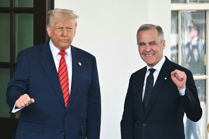 US President Donald Trump greets Canadian Prime Minister Mark Carney as he arrives at the White House on May 6, 2025
