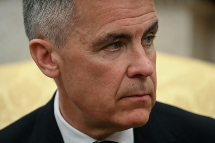 Canadian Prime Minister Mark Carney looks on as he meets with US President Donald Trump in the Oval Office of the White House in Washington, DC, on May 6, 2025.