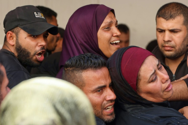 Palestinians mourn the death of loved ones in Gaza