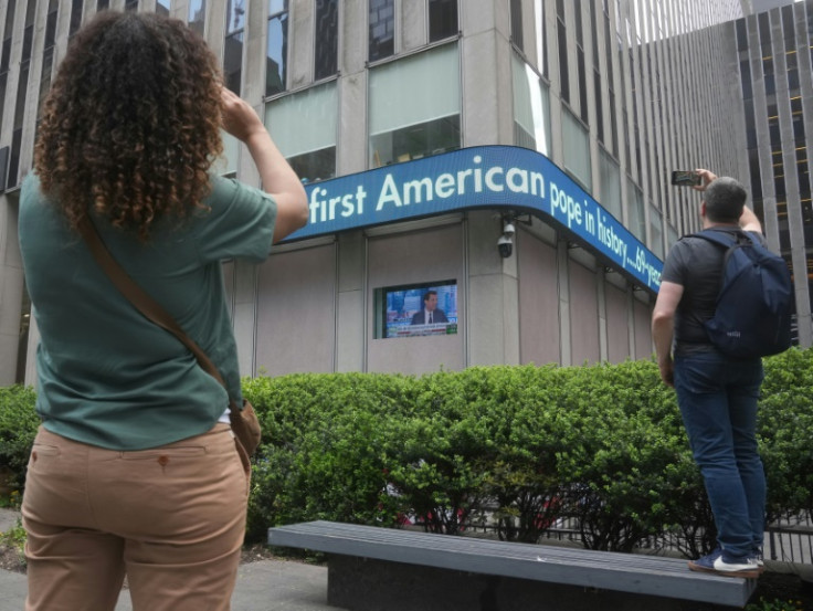 A news ticker outside the Fox News building announced the shock news of Pope Leo's selection to New York