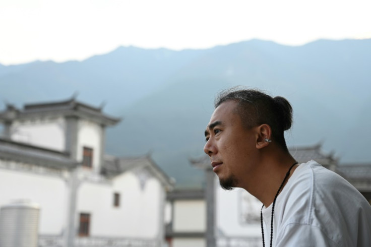 Some young Chinese are pushing back on city life and the office grind