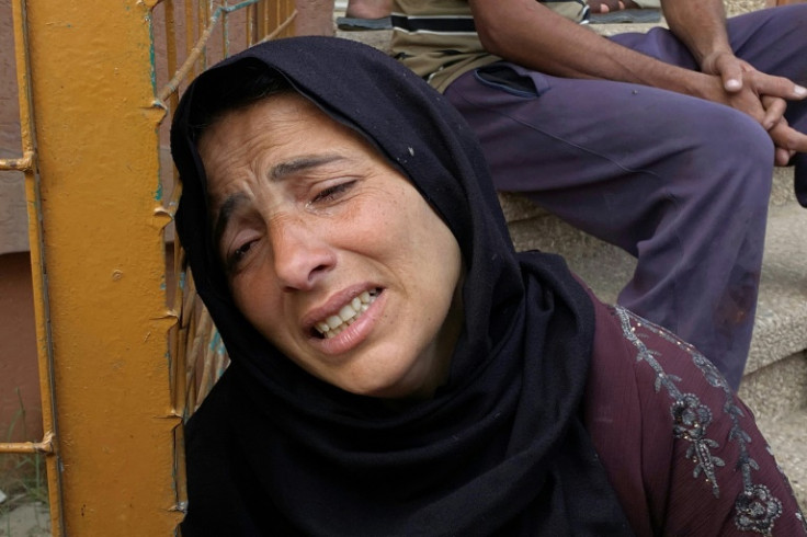 A Palestinian woman at the Nasser Hospital in Khan Yunis in southern Gaza mourns a relative killed in Israeli strikes