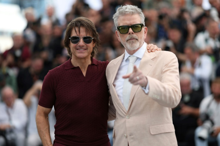 McQuarrie said the crew feared Cruise (L) had passed out during one stunt on a biplane