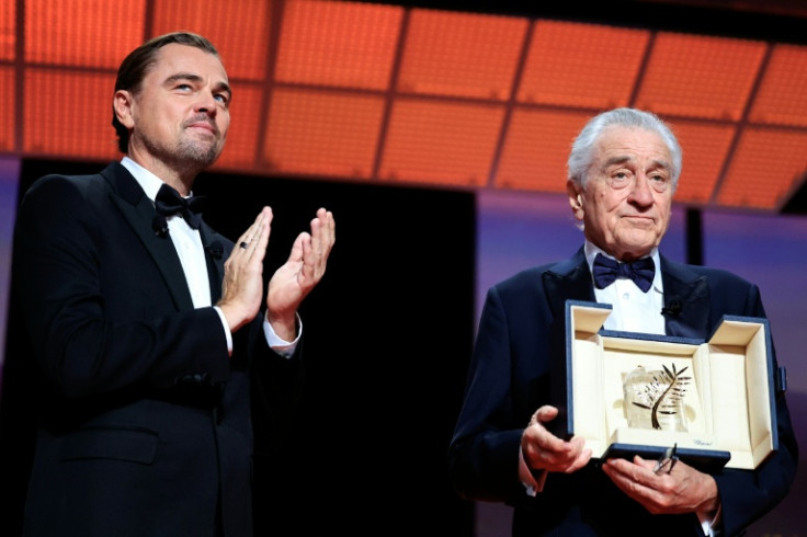 US actor Robert De Niro (R) received the Honorary Palme d'Or from US actor Leonardo DiCaprio