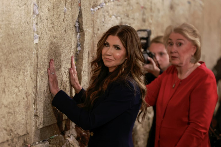 US Homeland Security Secretary Kristi Noem (C) and Janet Huckabee (R), wife of US Ambassador to Israel Mike Huckabee, visit the Western Wall on Sunday