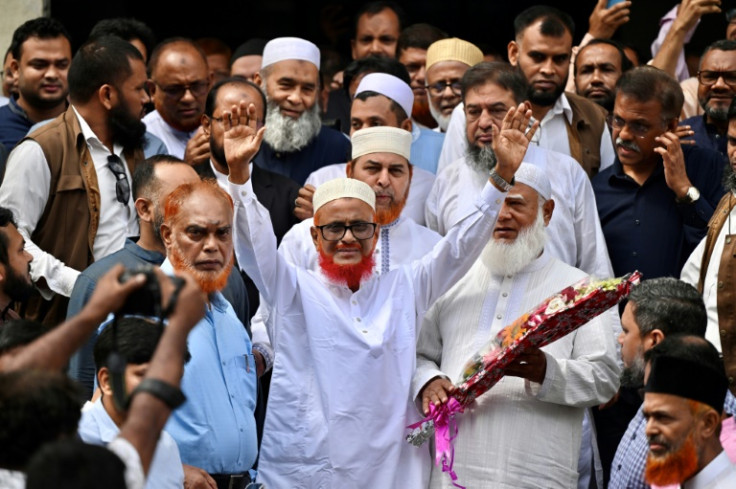 Bangladesh's Jamaat-e-Islami leader A.T.M. Azharul Islam (C) was released from prison in Dhaka on Wednesday