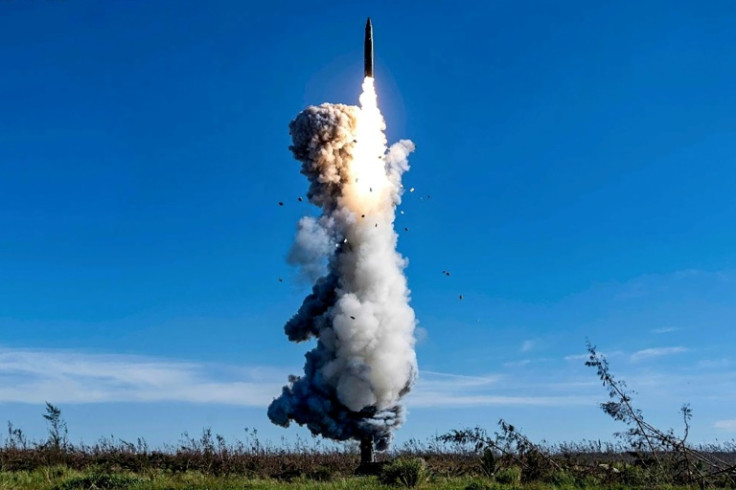 This handout photograph taken on September 25 shows the launch of a Chinese intercontinental ballistic missile that carried a dummy warhead into the Pacific Ocean